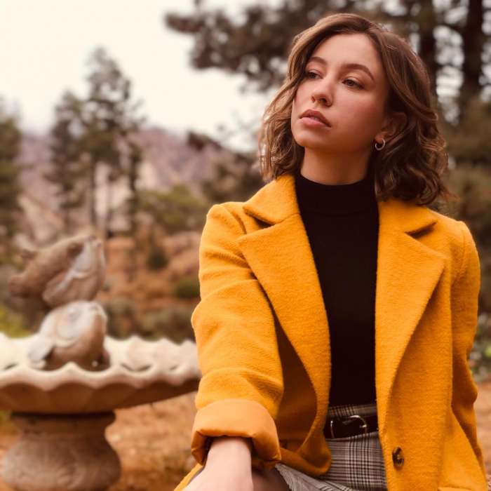 Katelyn Nacon in yellow