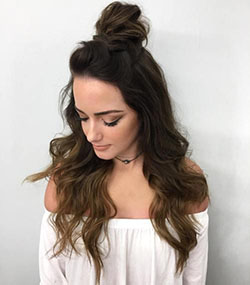 Add texture to your half bun by using a curling wand to achieve tousled waves.: Bob cut,  Long hair,  Mohawk hairstyle,  Top knot,  Hairstyle For Teens  