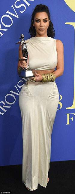 Kim Kardashian wore a skintight suit, Kim Kardashian dazzles in skintight white dress.: 