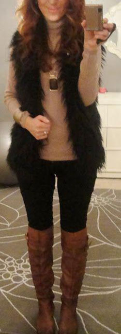 Generally I hate the faux fit vests, but I like this look. I think the black is ...: 