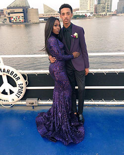 She's dazzling in blue, and next to him with that purple hue, they look amazing!: Black Couple Homecoming Dresses  