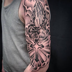 Top 10 ideas for cross tattoo designs, Praying Hands: Sleeve tattoo,  Body art,  Religious Tattoos  