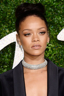Rihanna hair in a bun: Red Carpet Dresses,  Met Gala,  Box braids,  Top knot,  Rihanna Best Looks  