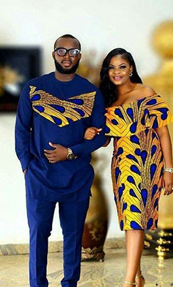 Take at look at african couple outfit, African wax prints: Wedding dress,  African Dresses,  Couple costume,  Kitenge Couple Outfits  