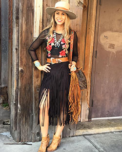 Colour outfit cowgirl street style woman on top, street fashion: Crop top,  Street Style,  Brown Outfit,  Fringe Skirts  