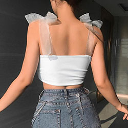White crop top with bow straps: Crop top,  Sleeveless shirt,  Tube top,  Shoulder strap,  Bow tie,  T-Shirt Outfit,  Shoelace knot,  Bandeau Dresses  
