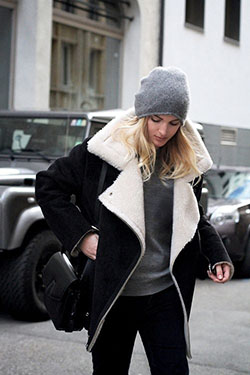 Black and white shearling jacket: winter outfits,  Shearling coat,  T-Shirt Outfit,  Flight jacket,  Knit cap,  Street Style  
