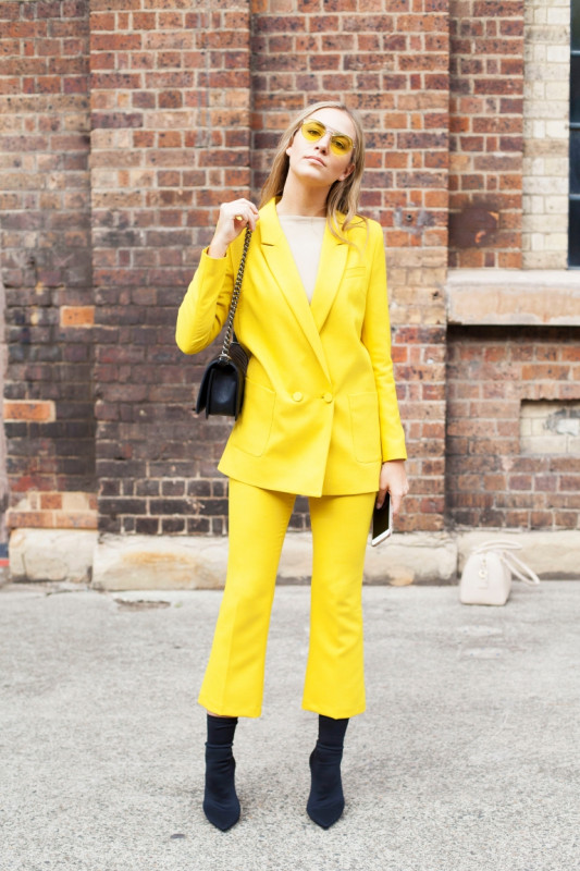 Yellow Is Rendered In Power Suit Form.: Power Suit,  Sunglasses,  Handbags  