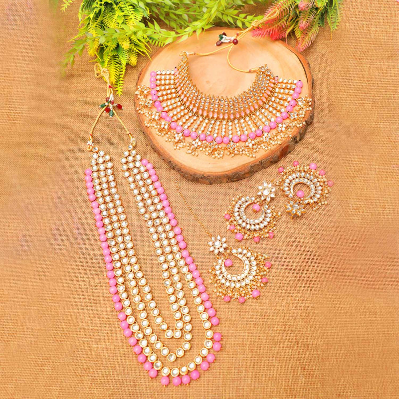 Magenta colour bridal kundan wedding necklace earrings tikkas for women: 