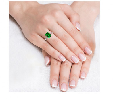 Exquisite Charm: Emerald Cut Emerald Ring: 