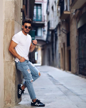 Men street style pose luggage and bags, men's clothing, ripped jeans, smart casual, men's style, t-shirt: 