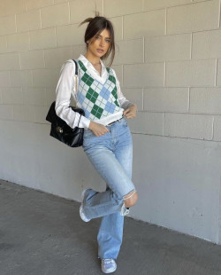 A Nod to the '90s with a Vibrant Green and White Sweater Vest and Relaxed Denim: 