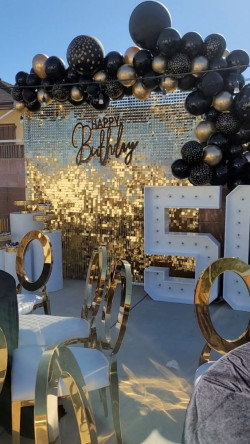 All about that sequin sparkle with black and gold balloons for a super glamorous fifty: 