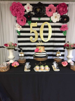 Welcoming fifty with a rosy reception among life’s many stripes. It’s a sweet mix of life’s ups and downs, celebrated beautifully: 