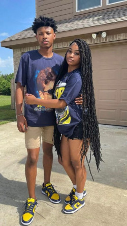 Check Out This Dynamic Duo in Graphic Tees and Cool Khaki Shorts Matching Outfit!: Couple costume,  Black people,  Black Couple  