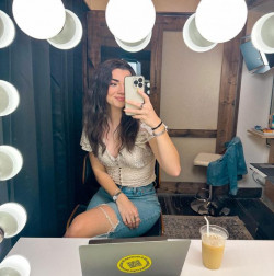 Brett Cooper is just nailing that mirror selfie with her cute white top and frayed denim!: 