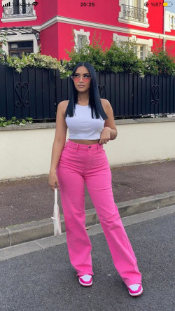 How gorgeous is she in those hot pink pants with the white top?: 
