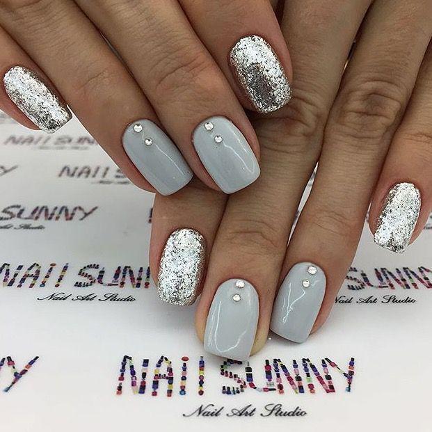 Winter nails! Love that silver glitter nails and stones!