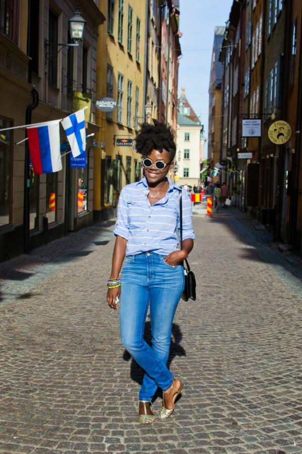 blue cotton top with same color denim jeans gives a glamorous look to the  girl. on Stylevore