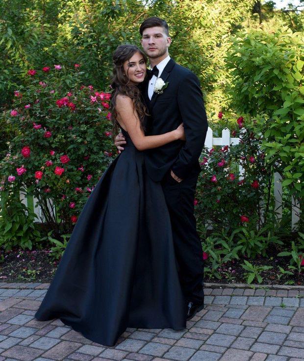 Slyssa Zarcone Scotto and Brandon Wren posing for a photo at St. Joseph Hill Academy's prom on June 7, 2017 at the Grand Oaks Country Club.: Prom Suit  