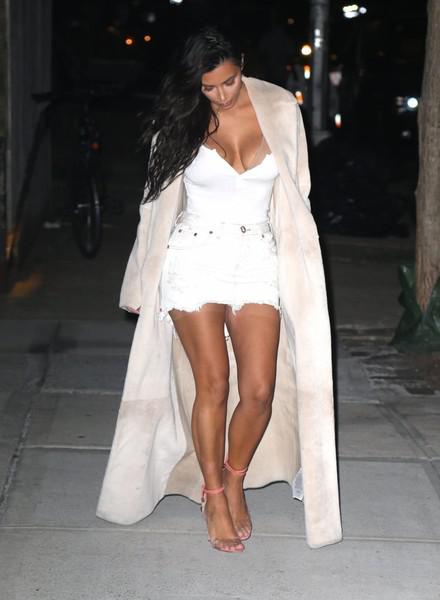 Kim Kardashian showcased her cleavage and tiny waist in this fitted white top while enjoying a night out in New York City.: Kim Kardashian  