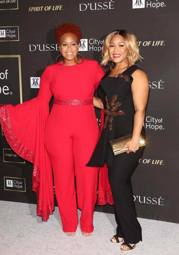 Trecina ‘Tina’ Campbell (L) and Erica Campbell (R) attend the City Of Hope Gala on October 11, 2018 in Los Angeles, California.: 