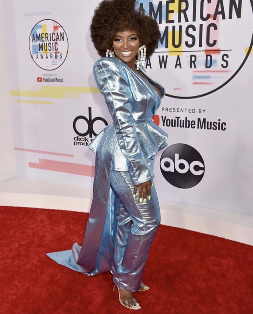 Amara La Nerga with blue pantsuit.: Sequin Pants  