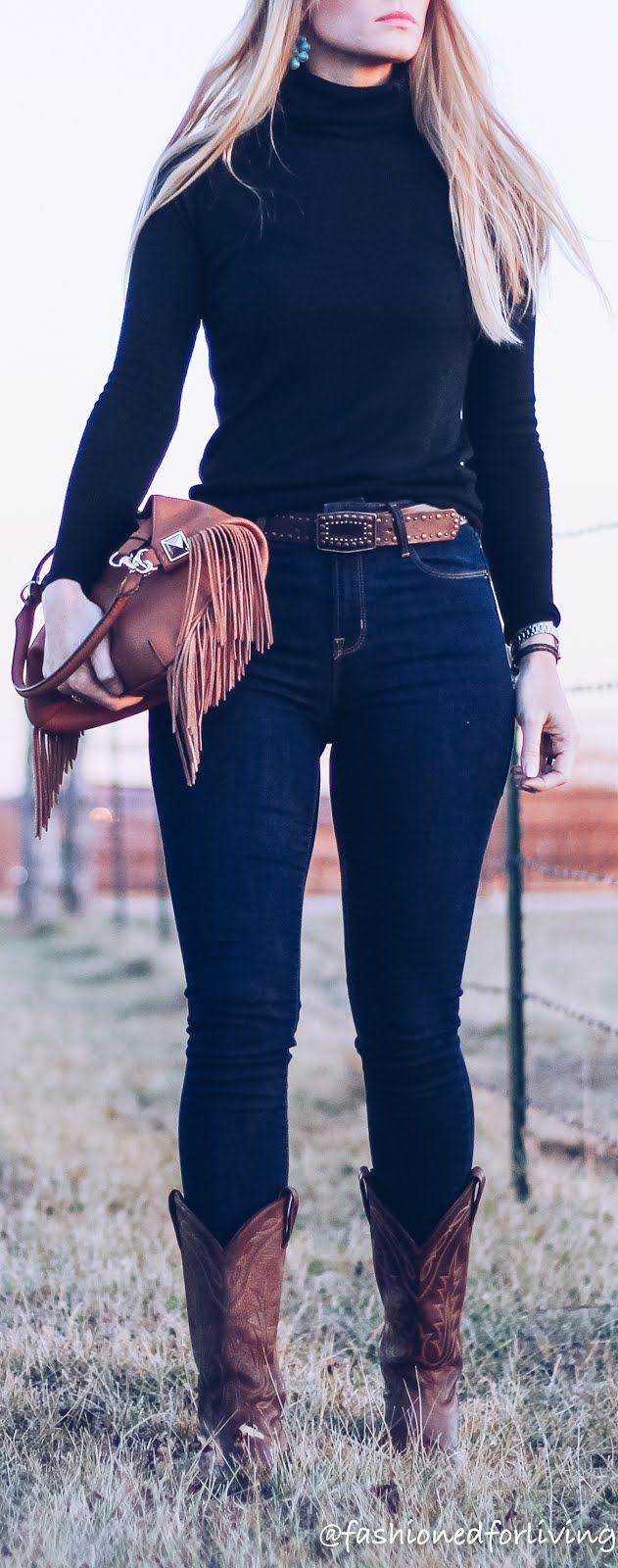 Civic en gang scene High waisted jeans outfit with cowboy boots and black turtleneck on  Stylevore