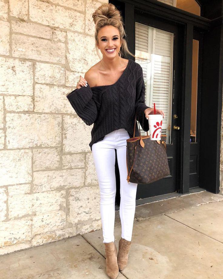 Off shoulder sweater with Bun hairstyle. on Stylevore