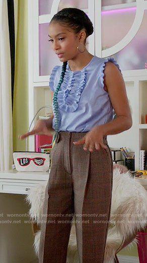 Zoey’s blue ruffled top and plaid trousers on Black-ish: 