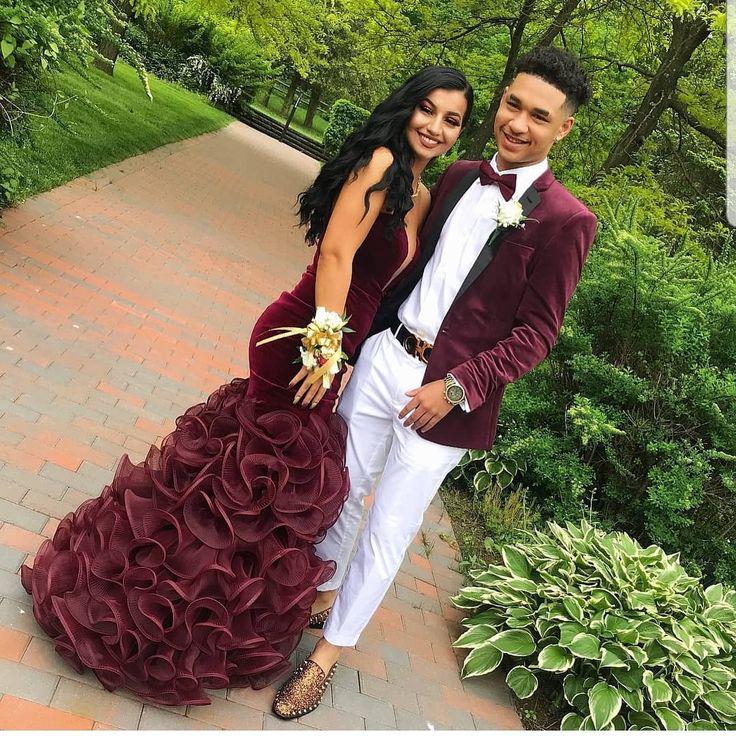 Stroll down the homecoming path in her ruffled burgundy gown and his crisp white suit!: Ball gown,  Flower Bouquet,  Black Couple Homecoming Dresses  