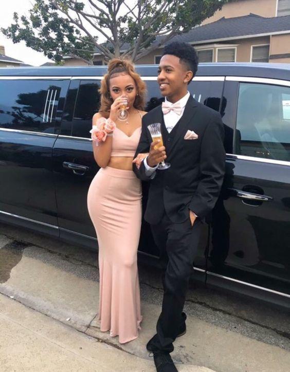 Look how she rocks that peach bodycon dress, while he looks sharp in his sleek black tuxedo!: party outfits,  Backless dress,  Black Couple Homecoming Dresses  