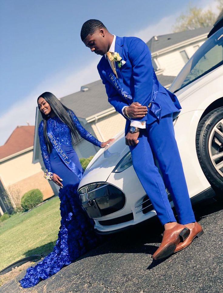 Her gown adorned with ruffles and him in a sharp blue suit!: Black Couple Homecoming Dresses,  Sequined Dress  