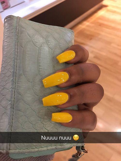 Yellow coffin nails on dark skin on Stylevore