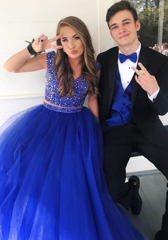 royal blue and gold prom couple