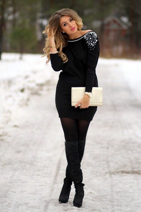 Long boots and black dress on Stylevore