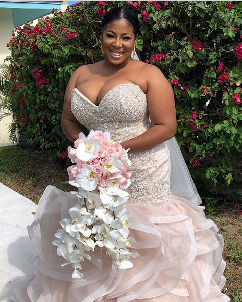 Black plus size bride: Wedding dress,  Flower Bouquet,  Floral design,  African Wedding Dress  