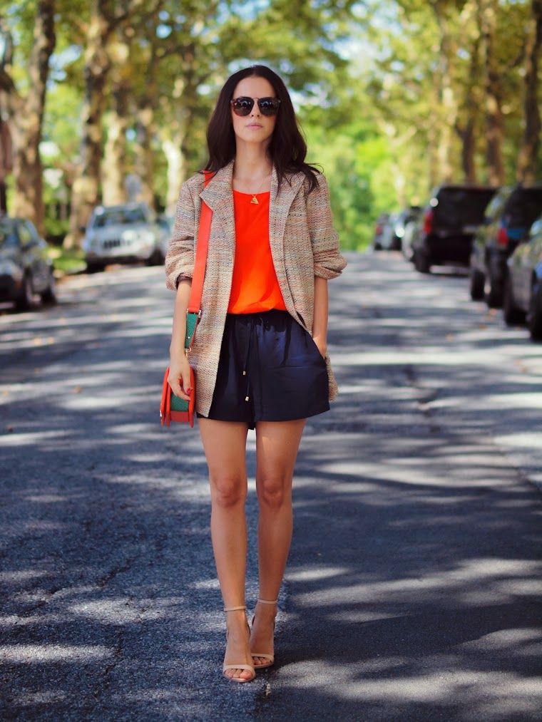 Orange tank top outfit, Sleeveless shirt: Sleeveless shirt,  Black Shorts,  Orange Dress  