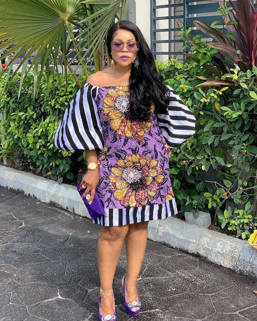 Rocker-style ankara styles, African wax prints: Aso ebi,  Short African Outfits,  Ankara Short Gown  