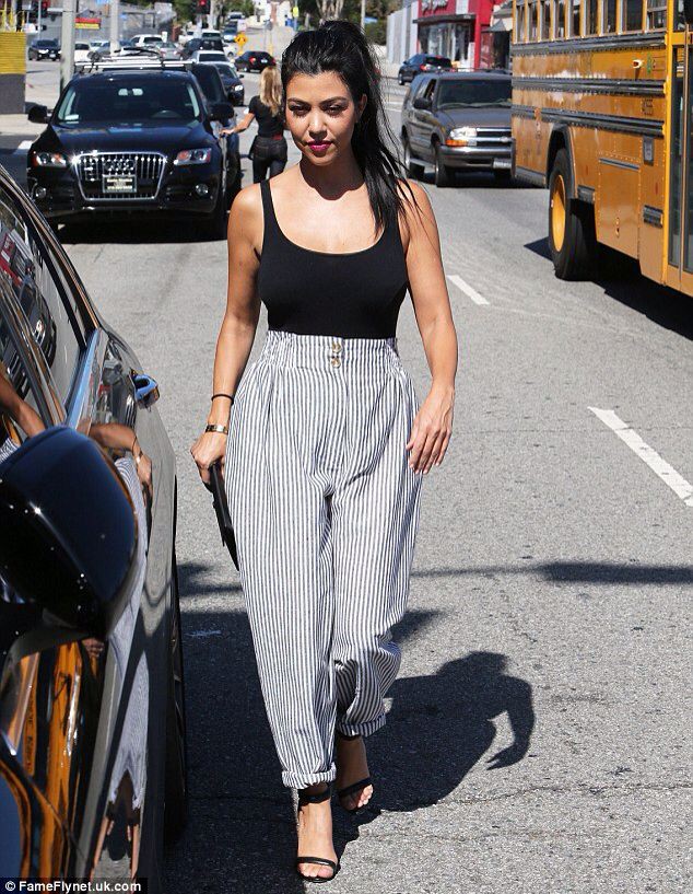 Kourtney kardashian striped trousers, Kourtney Kardashian: Kim Kardashian,  Scott Disick,  Kourtney Kardashian,  Harem pants,  Parachute pants,  Celebrity Style,  Pleated Trousers  