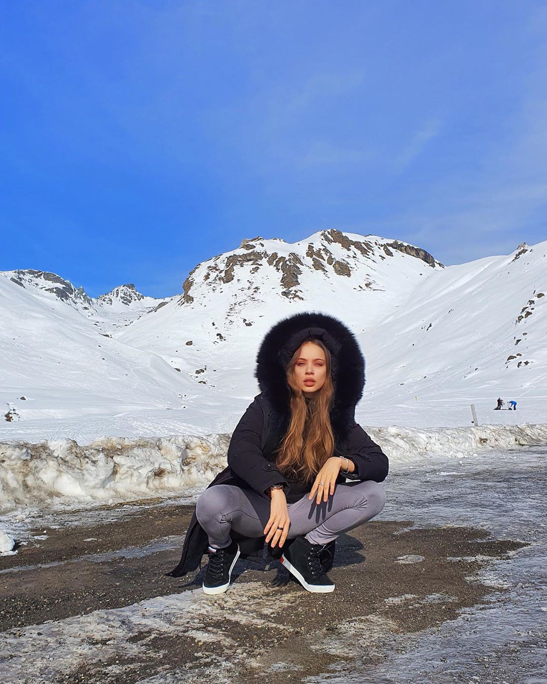 Xenia Tchoumitcheva model photography, Black Natural Hair, mountainous landforms: Black hair,  White Jacket  