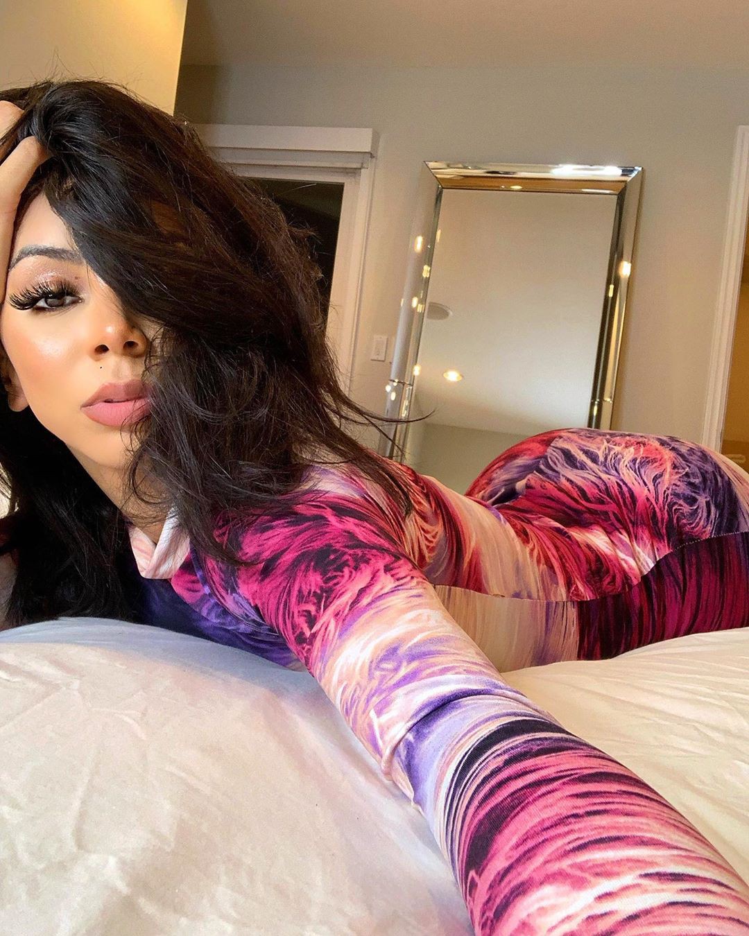 Brittany Renner legs pic, Dark Black Hairs, Long Hairstyle Girls: Brown hair,  Purple And Pink Outfit  