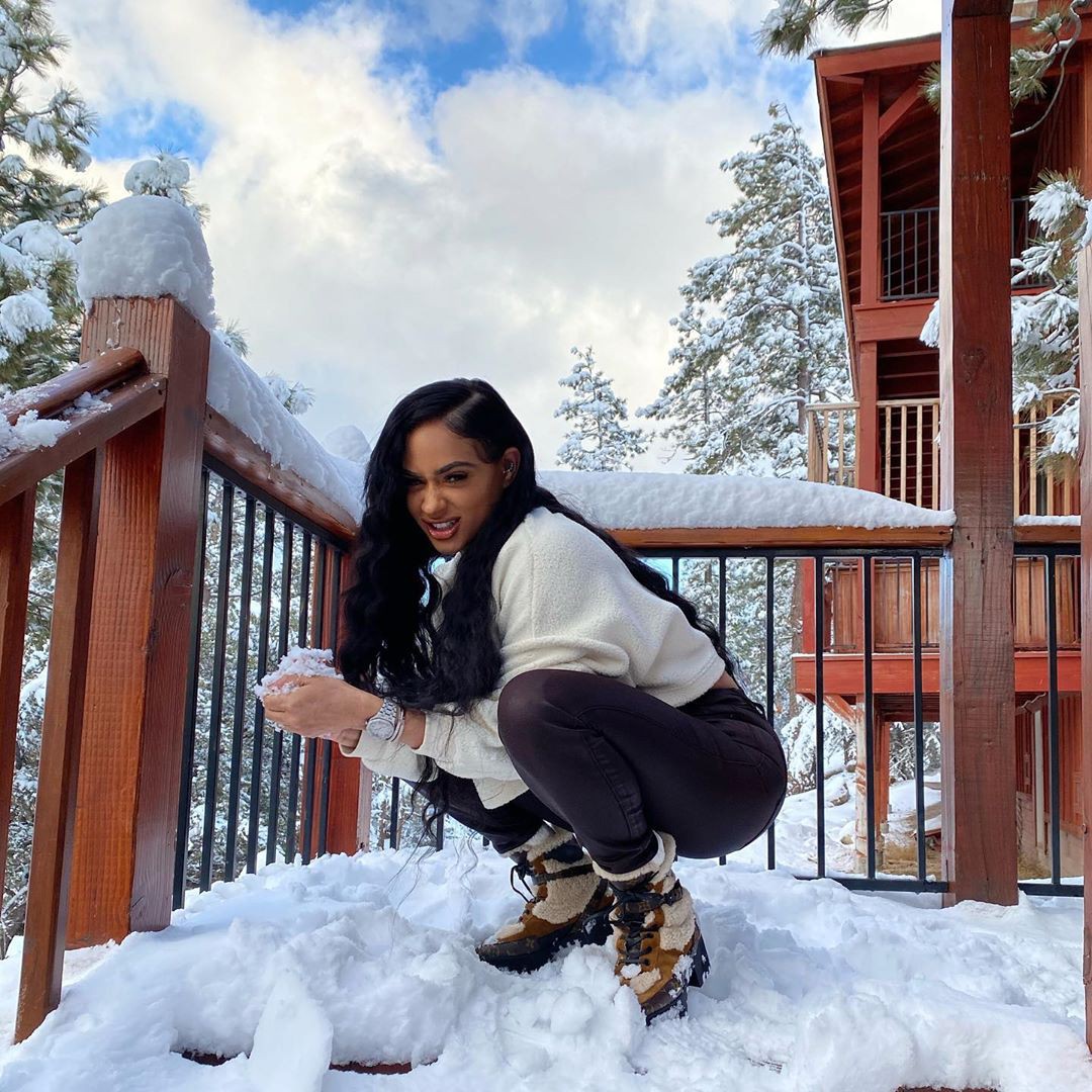 Tori Brixx enjoying life, playing in the snow, footwear: 