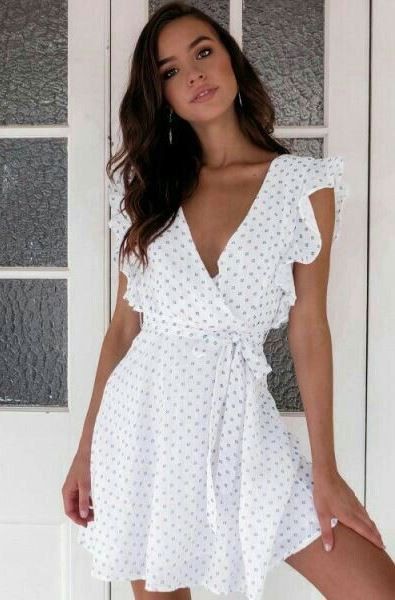 White outfit Stylevore with cocktail dress, wrap dress, dress | Casual ...