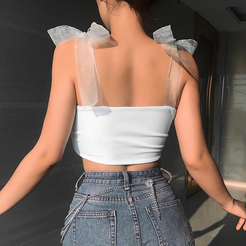 White crop top with bow straps: Crop top,  Sleeveless shirt,  Tube top,  Shoulder strap,  Bow tie,  T-Shirt Outfit,  Bandeau Dresses  