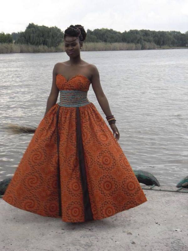 African dresses designs for weddings: Strapless dress,  instafashion,  Formal wear,  Roora Dresses,  Bridal Party Dress,  Orange Outfits,  African Wax Prints  