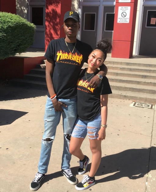 They're totally in sync, wearing edgy black tees and ripped jeans!: man,  toromoda t-shirts for couples nirvana,  Couple costume,  Bermuda shorts,  Black Couple  