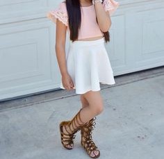 Pink crop top with a white skirt: 