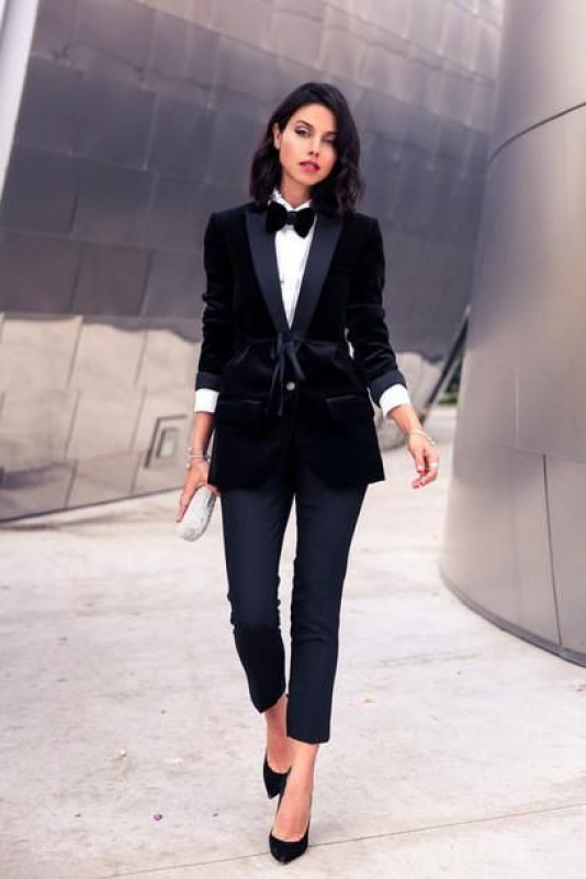 Black Colored Power Suit: Power Suit,  Black suit,  Clutch bag,  Short hair  