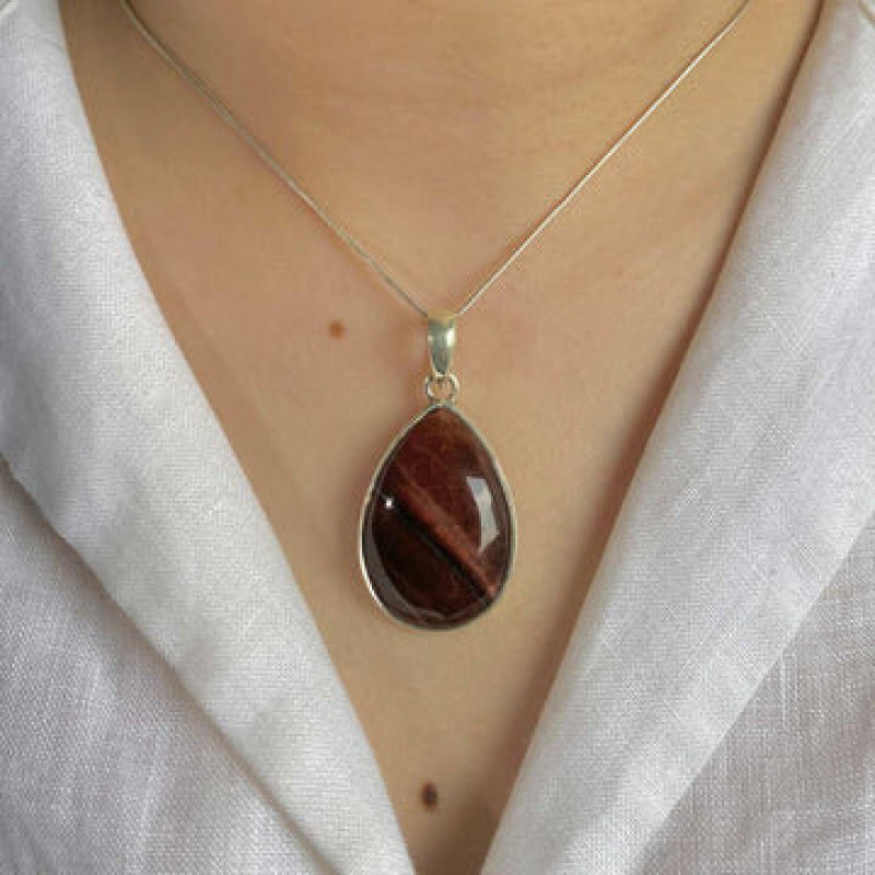 Clasp the Fiery Energy of the Red Tiger Eye: A Vibrant Crystal by your Side: 